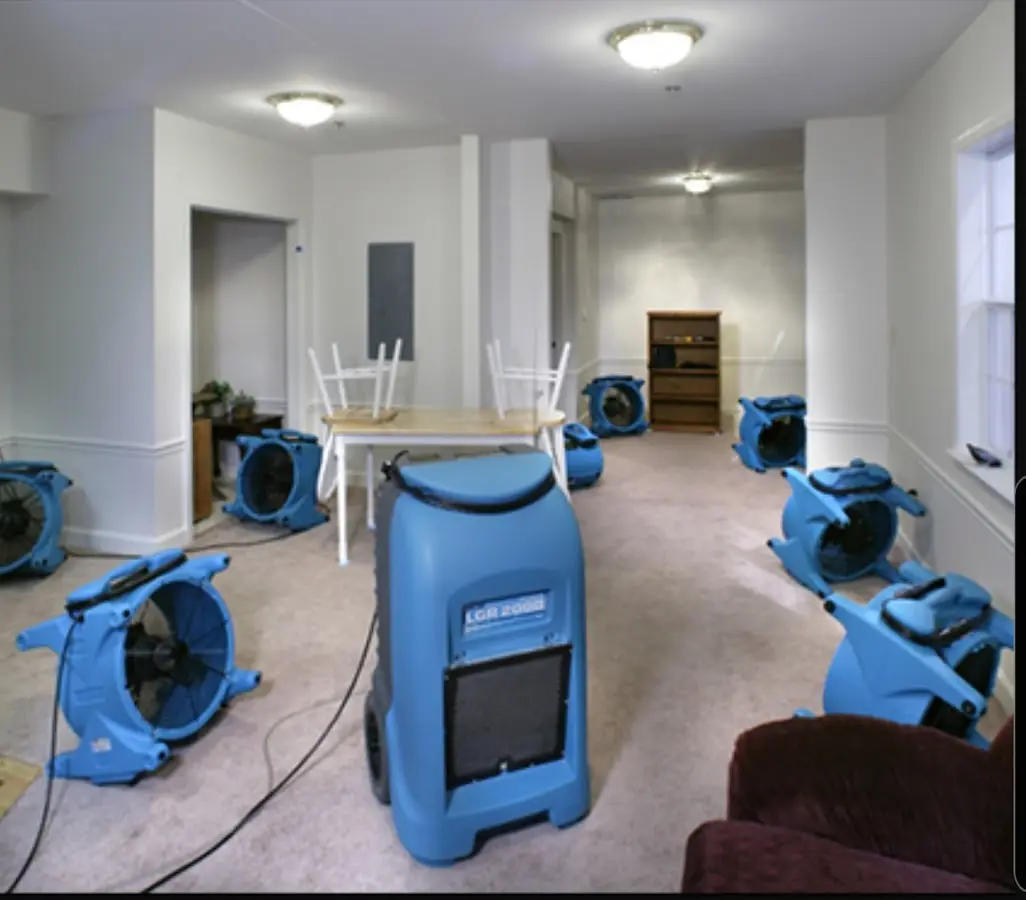 Air movers and dehumidifier setup for Water Damage Restoration in Anoka